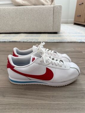 Nike White Sneakers with Red Swoosh and Light Blue Sole Stripe